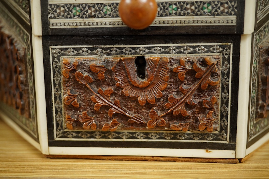 An Anglo-Indian Vizagapatam sandalwood and bone stationery box of tapered form, 23cm wide. Condition - good, base cracked